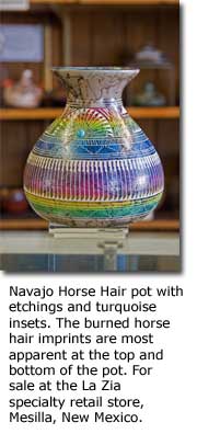 Navajo Horse Hair pot with etchings and turquoise insets. The burned horse hair imprints are most apparent at the top and bottom of the pot. For sale at the La Zia specialty retail store, Mesilla, New Mexico.