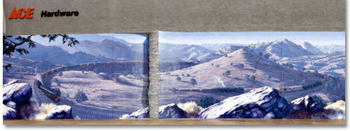 TRAIN ART: An artist's rendition of the famous Tehachapi Loop is painted on the side of an Ace Hardware store in the town of Tehachapi.