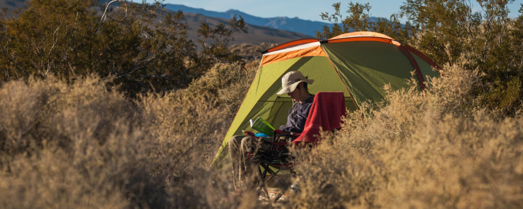 A camper at Mesquite Springs in Death Valley.