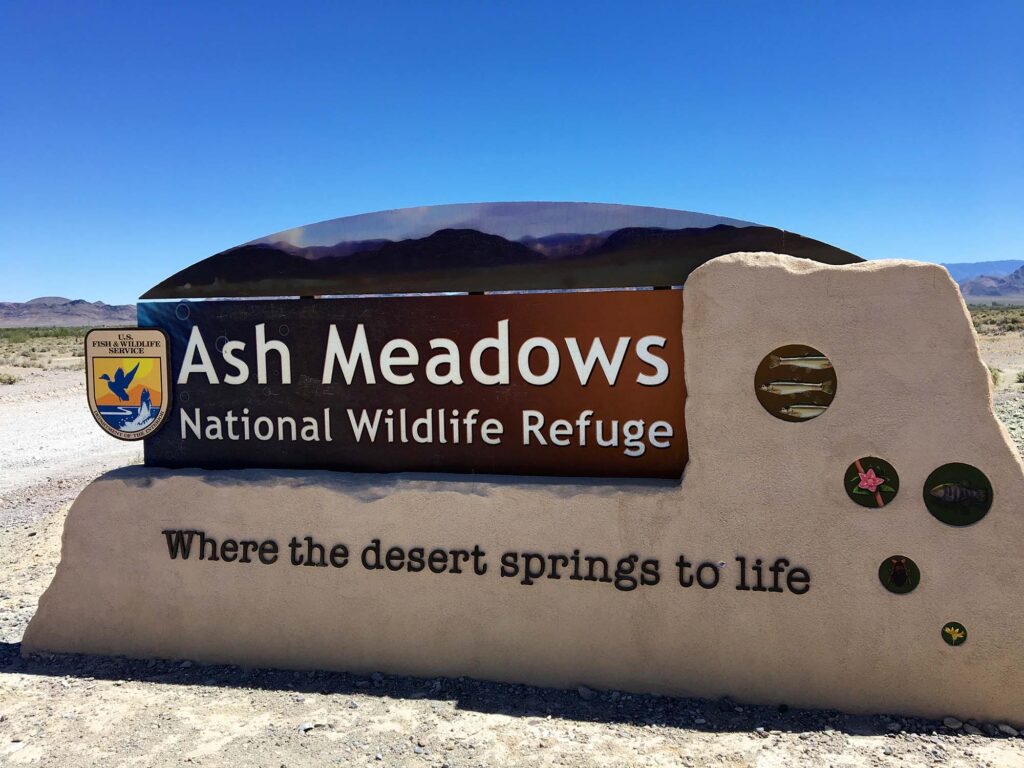 Ash Meadows National Wildlife Refuge entry sign. Photo by By John Mackenzie Burke, CC BY-SA 4.0,