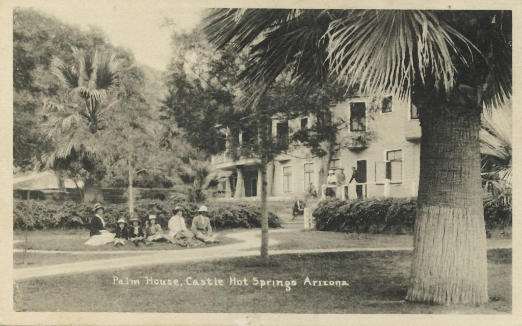 Visitors next to the Palm House at Castle Hot Springs, Arizona, in 1908. Photo By Unknown. Public Domain.