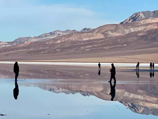 "Lake Manly", the temporary shallow lake at Badwater Basin, early morning on December 24, 2023. NPS photo by Abby Wines
