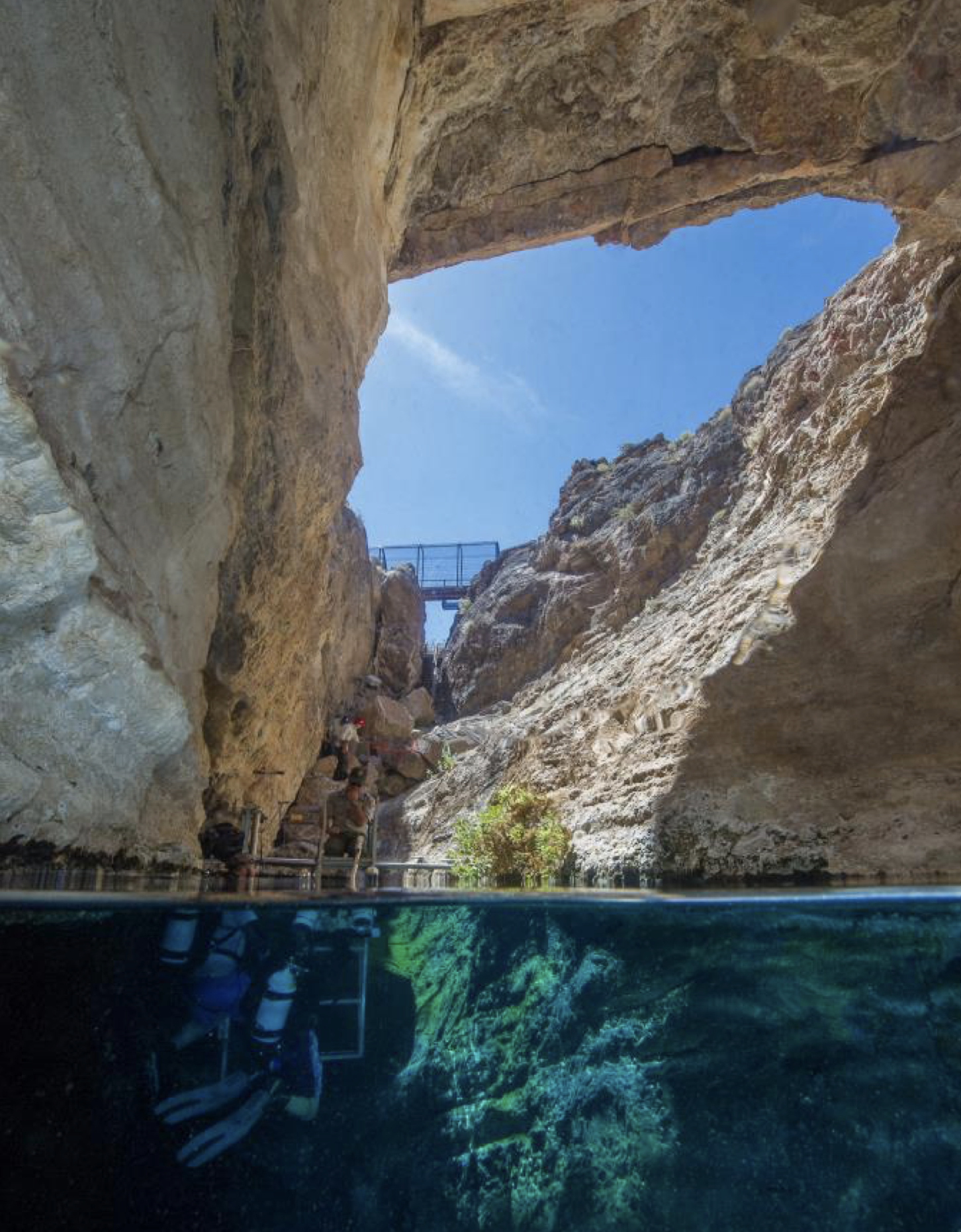 Devils Hole. This view was taken by a diver in the water looking up at the public overlook deck. Photo NPS.