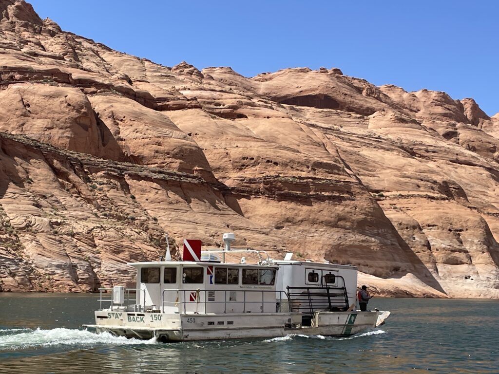 A horse trailer loaded on an NPS work vessel was used to remove two horses stranded in Navajo Canyon. NPS